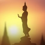 Shakyamuni Buddha standing in silhouette